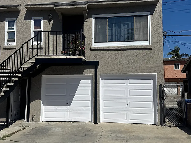 Exterior of unit 1060 above garage and parking spot