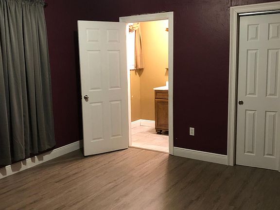 Master bedroom with half bath