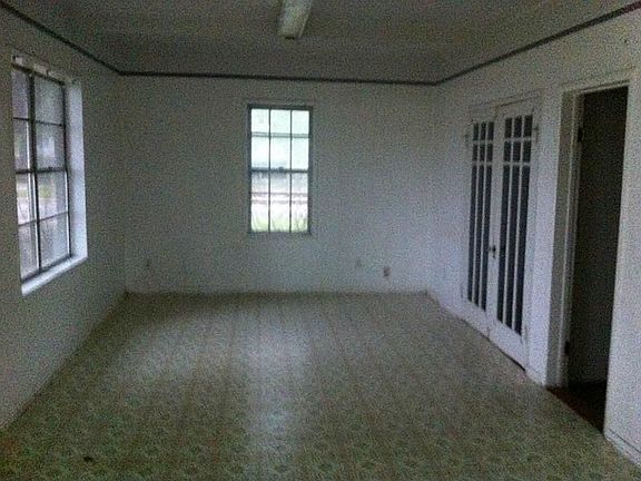 Sun room off off Living room with access to backyard.
