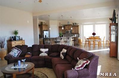 View of living/dining and kitchen