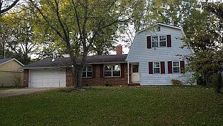 Large yard with 2 car attached garage on quiet street