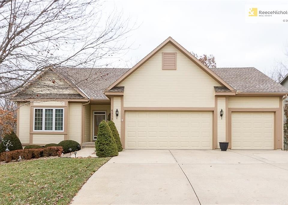 Welcome to 6212 W 155th Street, located in Overland Park in The Estates of Blue Valley.
