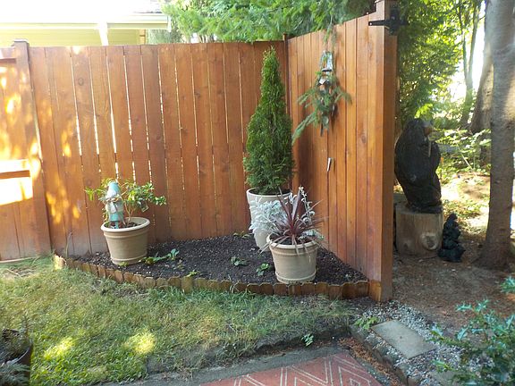 GATE LEADS TO WALKING TRAILS