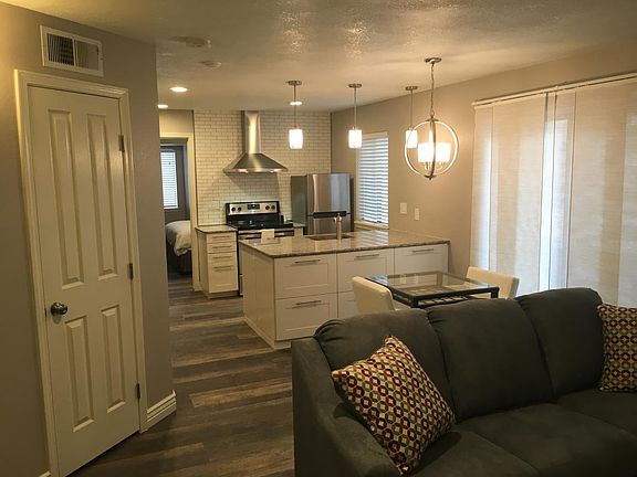 Full-size double sofa in living room pulls out in seconds.