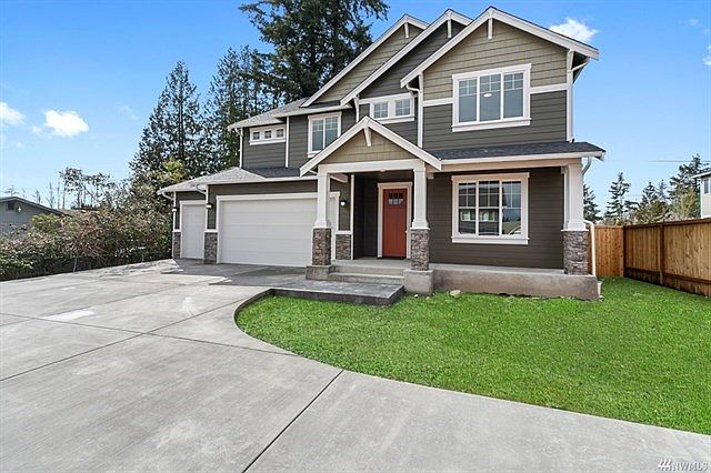 Front of home. 2833 sf with 3 car garage.
