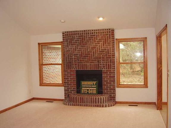 Large family room with brick fireplace