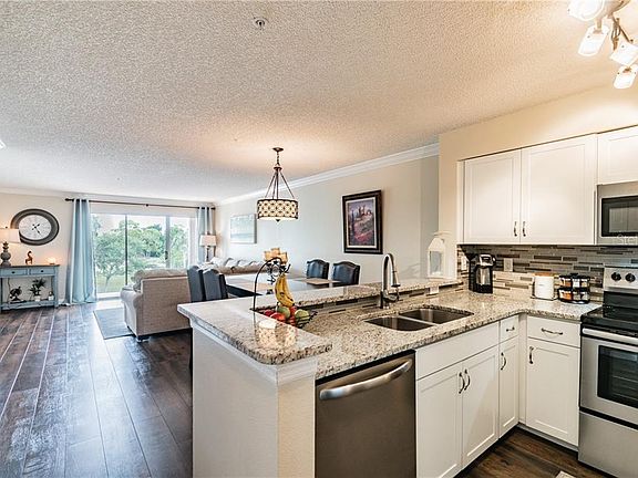 4th image of 2400 Feather Sound Dr APT 525