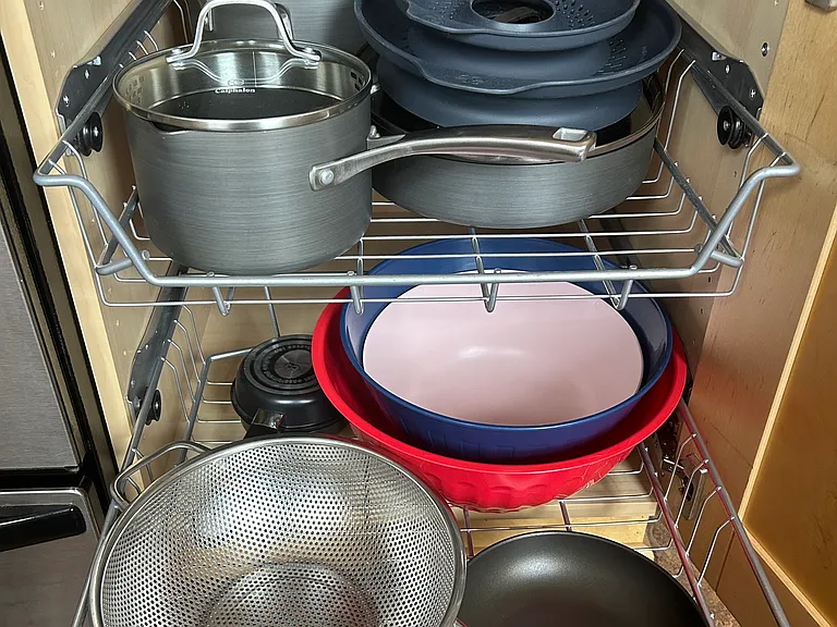 Pots, pans, mixing bowls, strainer, etc.