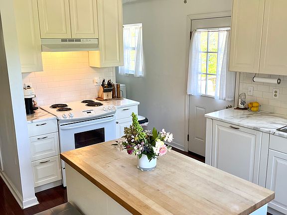 This house is rented unfurnished. Pictured here furnished to help you visualize the space.