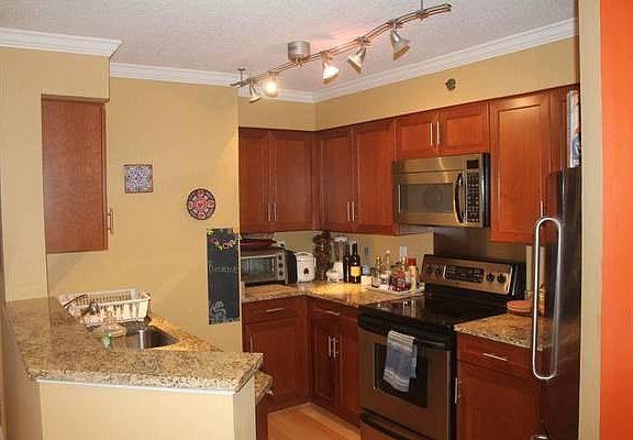 All updated appliances and nice marble counters.