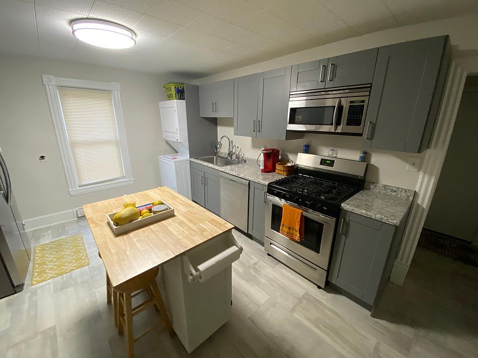 Recently renovated kitchen with new stainless steel appliances (fridge, dishwasher, range/oven