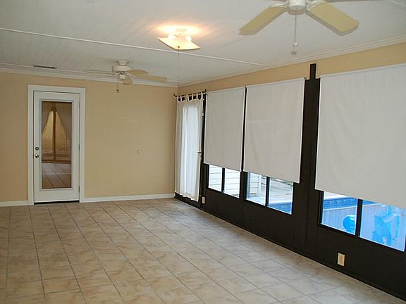 Beautiful sun room along back of home
