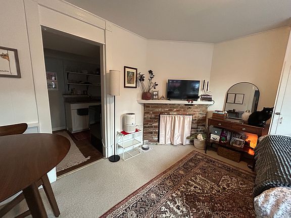 Living Area with decorative fireplace