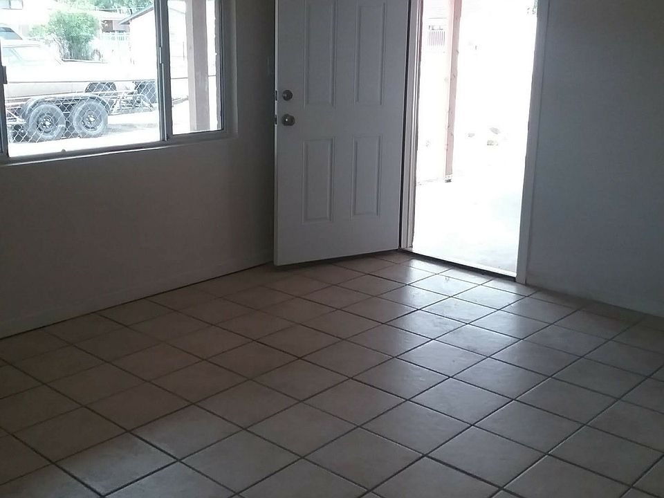 Entry Door & West side Window