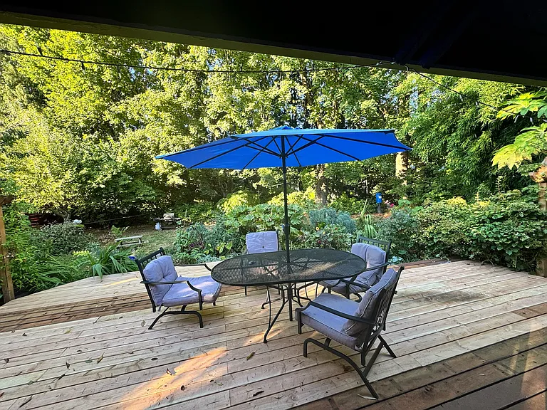 private backyard patio, fully fenced.