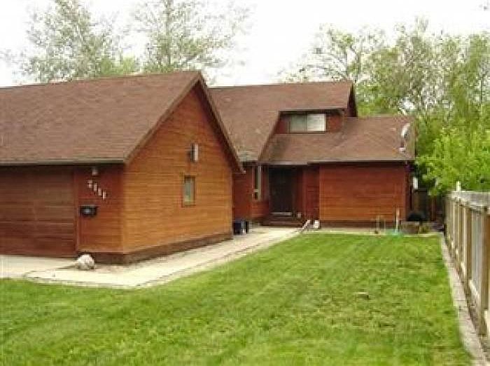 FRON OF HOME 2 CAR GARAGE