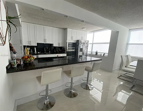 1200 NE Miami Gardens Dr #206W Photo 1