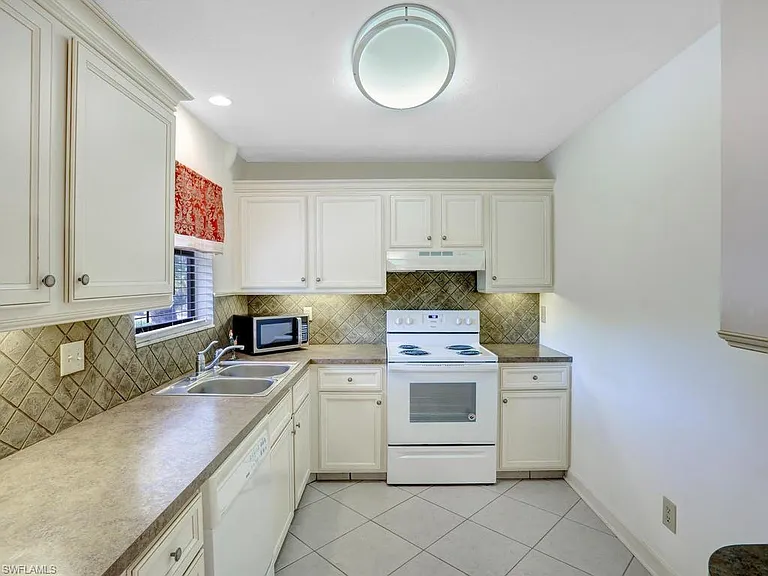 5501 Rattlesnake Hammock Rd #209-1 — Photo 11