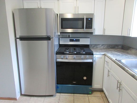 Brand new Refrigerator with ice maker and new Stove.