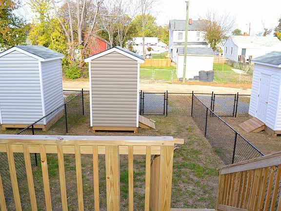 Fenced in Rear yard with shed and driveway