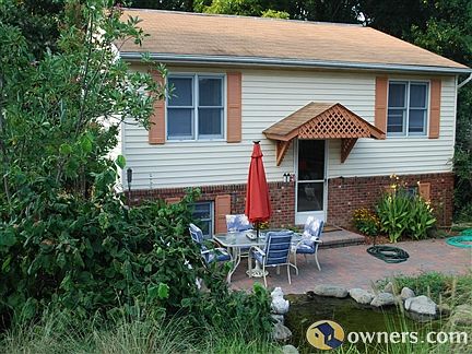 View of Front of House with Patio