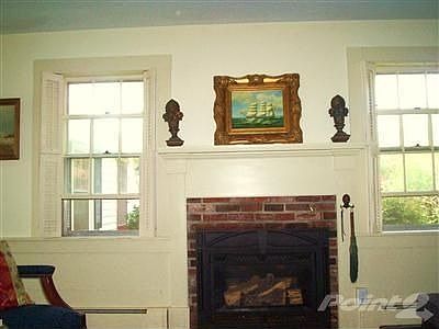 Handsomely restored Natural Gas Fireplace.