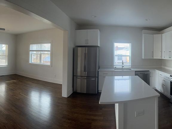 Pano view of kitchen and living room