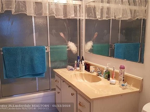 Bathroom with enclosed tub & shower - dual entrances