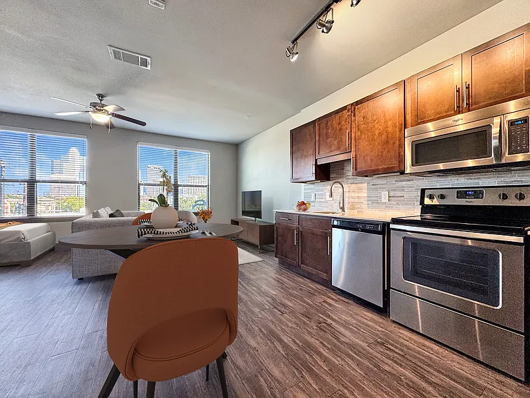 Experience city living with this stylish open-plan apartment, featuring sleek design and natural light. Experience city living with this stylish open-plan apartment, featuring sleek design and natural light.