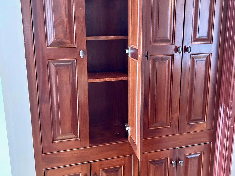 Wooden cabinets with soft close hinges.