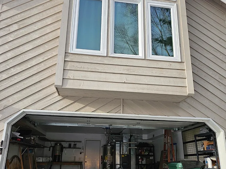 Garage. House entry door straight ahead. Keypad code, plus garage door opener available for $50 refundable deposit.