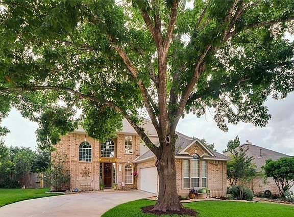19108 Ganton Ct with wonderful shaded driveway on cue-de-sac!