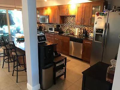 KITCHEN STAINLESS APPALIANCES GRANITE COUNTER TOPS