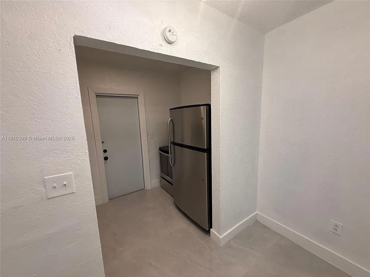 Building Photo - 1251 NW 61st St #5