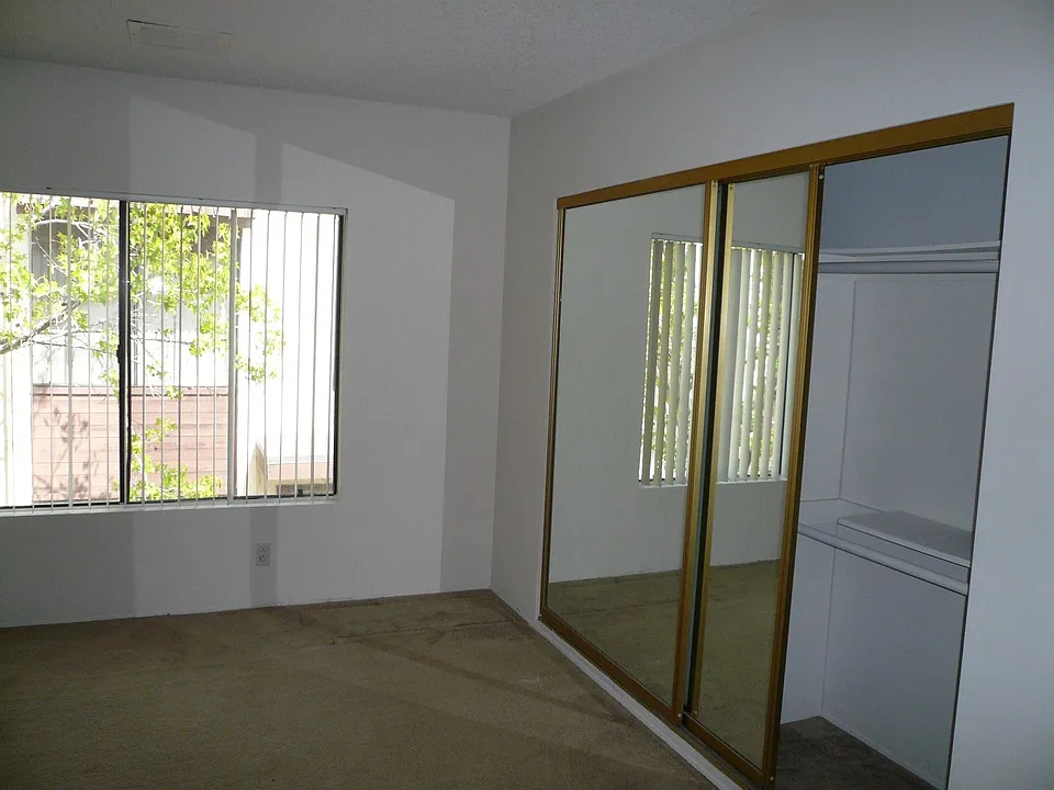 Large closets with mirrow doors