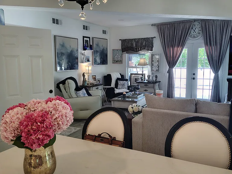 View of left side of living room from huge island.