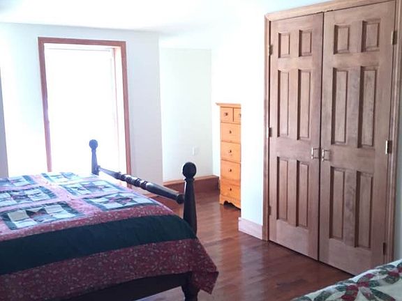 Closet and window one bedroom