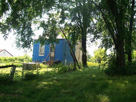 back  view, yard and attached lot  