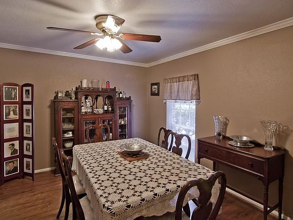 Your antique furniture will be showcased in this banquet-sized dining room
