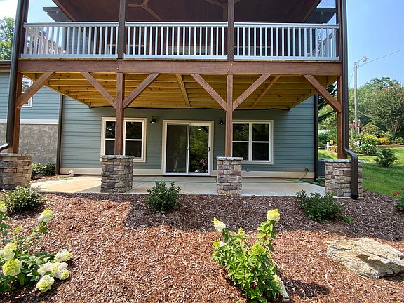 Covered back patio for grilling and entertaining.