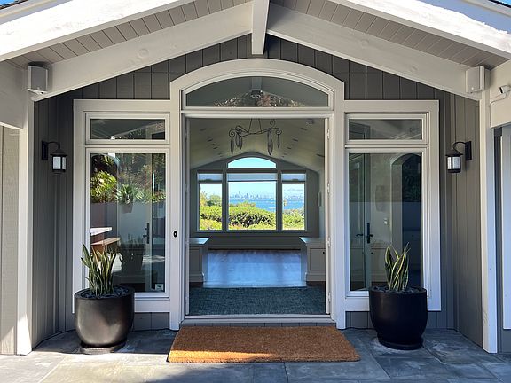 Glass French door entrance facing view of San Francisco