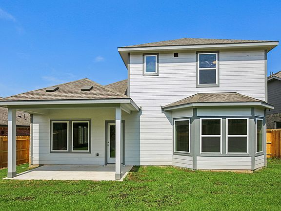 The backyard of a home of Stewart s Ranch of Conroe, TX.
