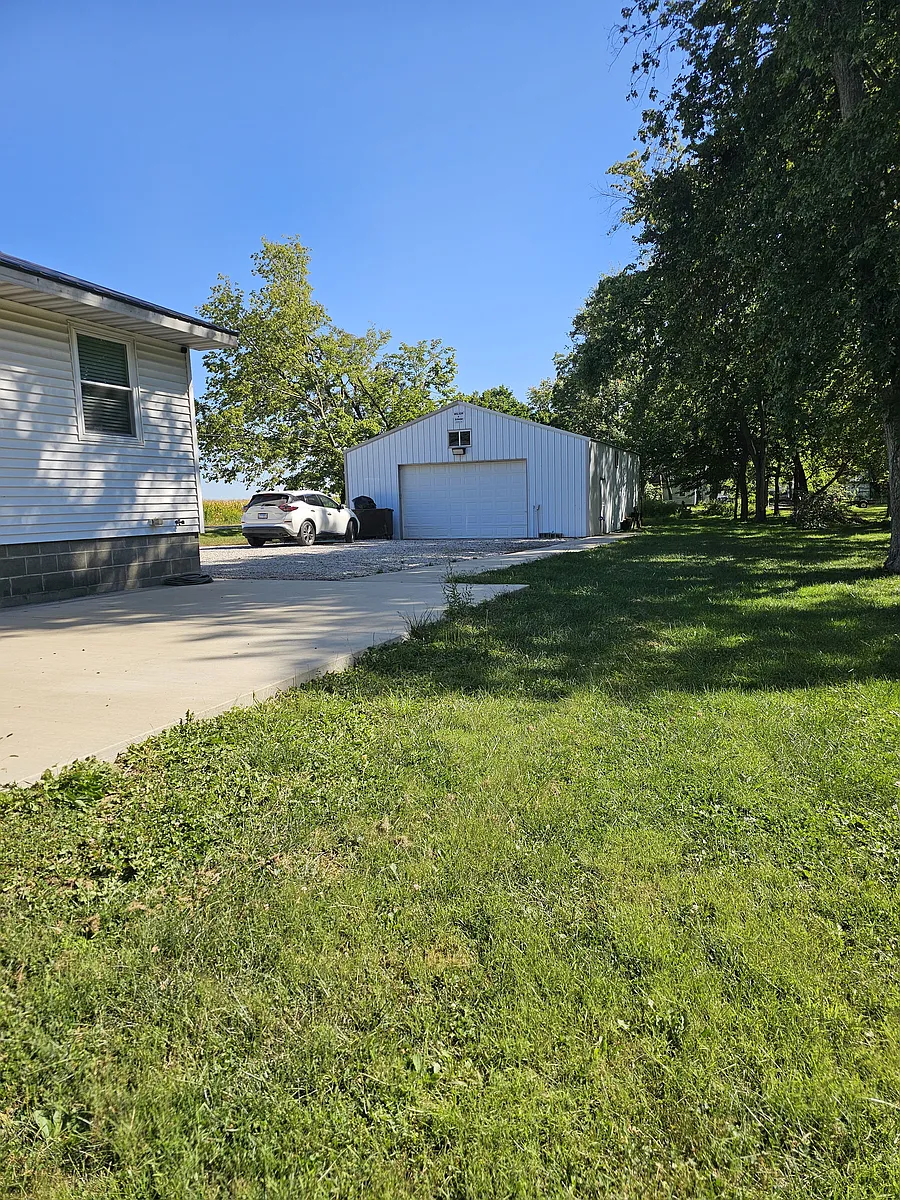 Back yard showing polebarn - 7415 W Main St