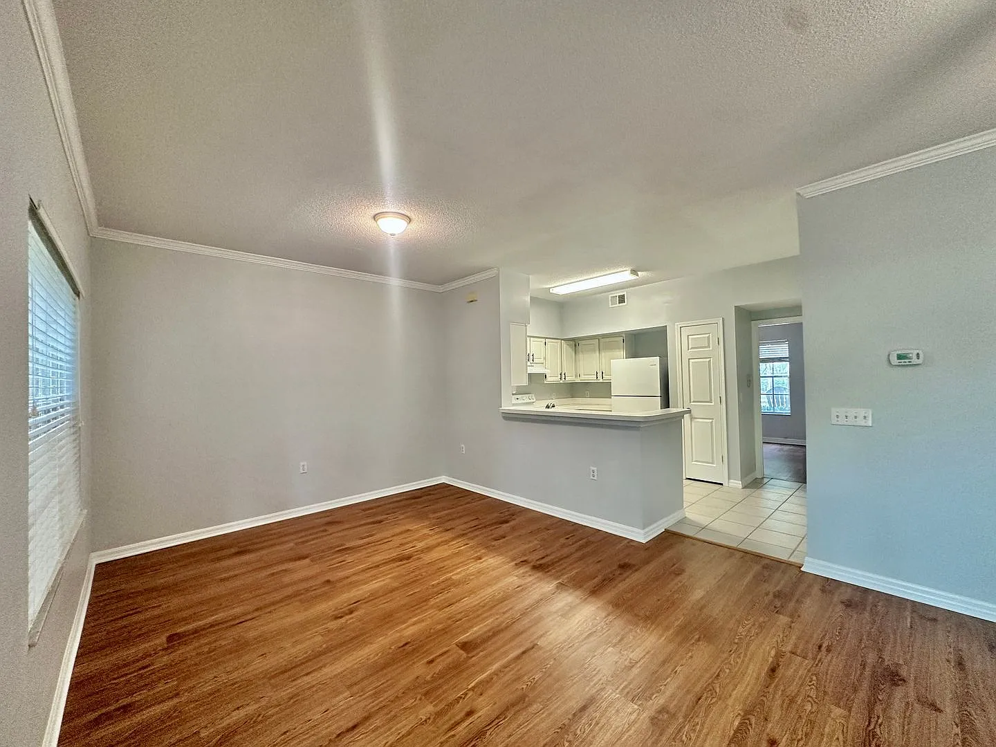 Spacious 2BR/2BA Ground Floor Condo with Golf Course Views Pool & Gym Access! — Photo 4
