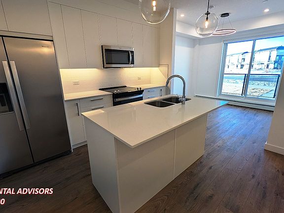 2nd image of 63 Corner Glen Cres NE #1106