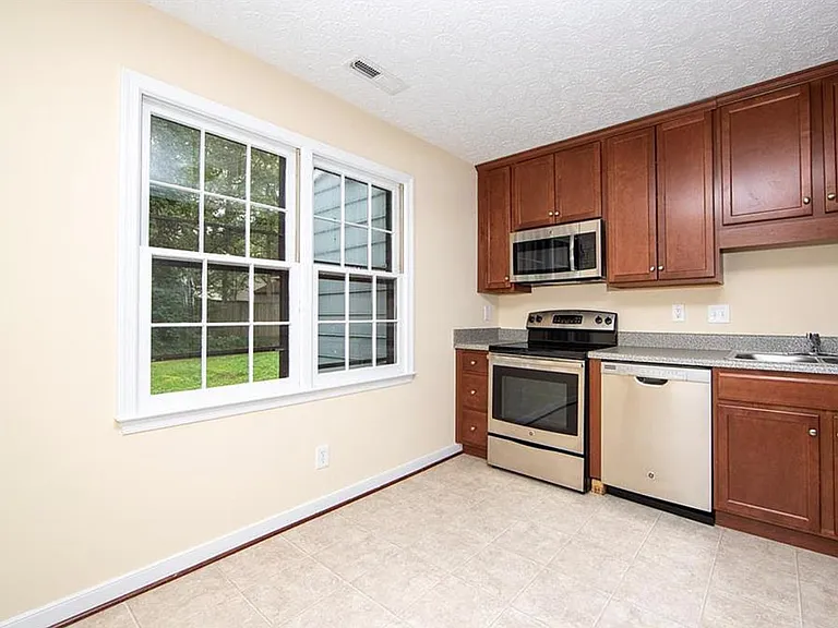 These windows were replaced with Pella double-pane windows in 2024.