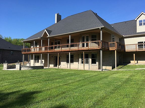 Full deck overlooks woods