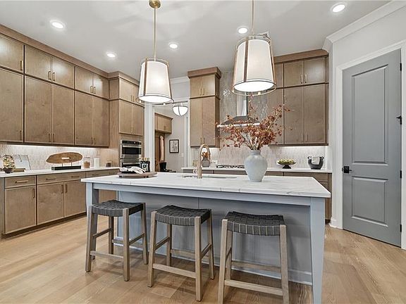 Picture is not of actual home but of model home of same floorplan This is a to be built lot of the