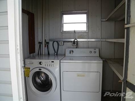 SHED WITH WASHER AND DRYER