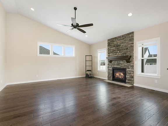 Great room stone gas fireplace from floor to ceiling